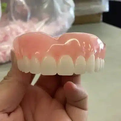 Can I reshape my dentures myself?