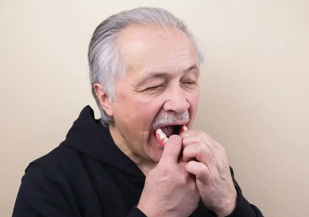 Can I sleep in my dentures?
